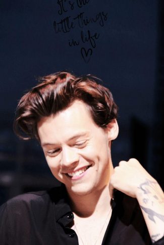 Download A Smiling Harry Styles Wallpaper Cellularnews