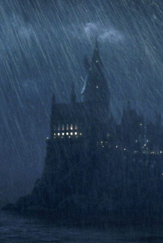 Download Harry Potter Hogwarts On A Rainy Night Wallpaper Cellularnews