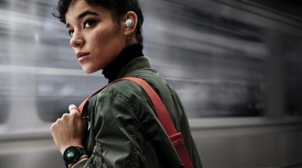 a girl wearing galaxy buds