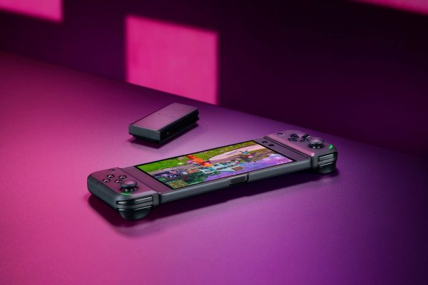 a handheld gaming console lying on a flat surface