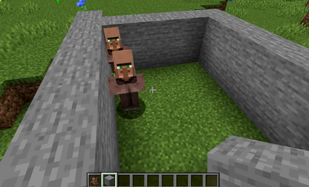 Two minecraft villagers trapped between walls