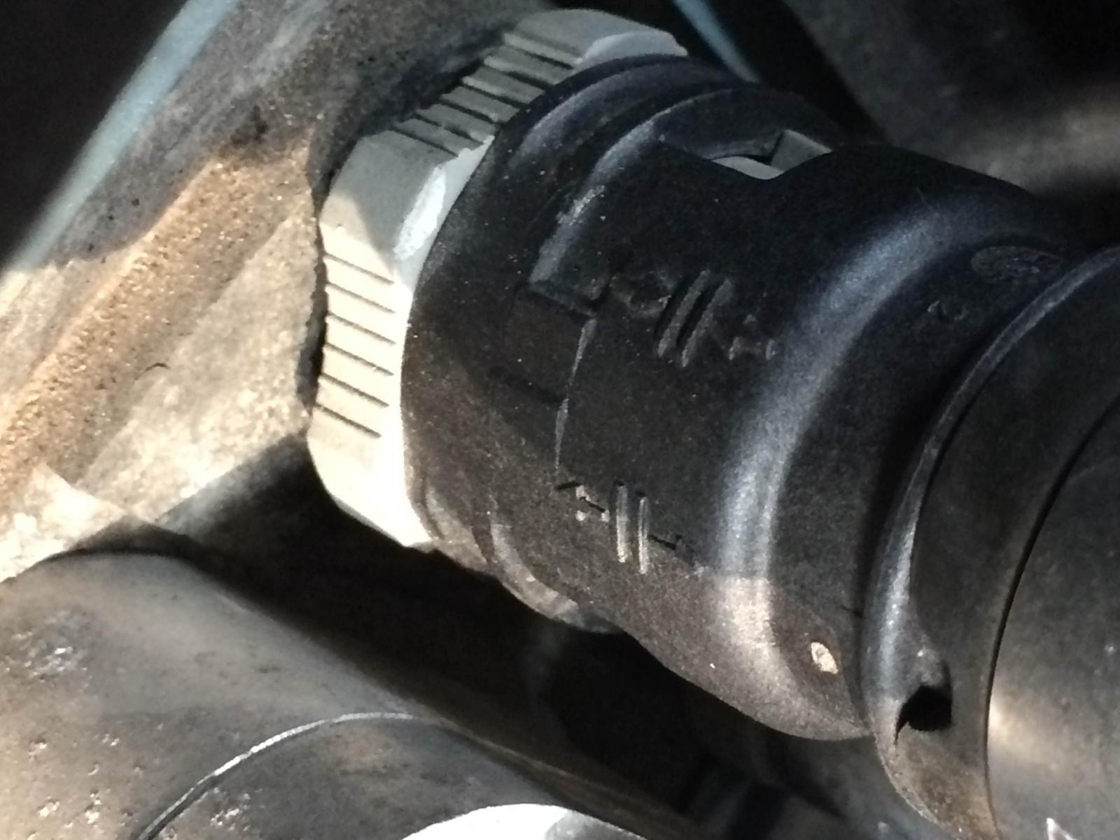 how-to-remove-ford-heater-hose-connector