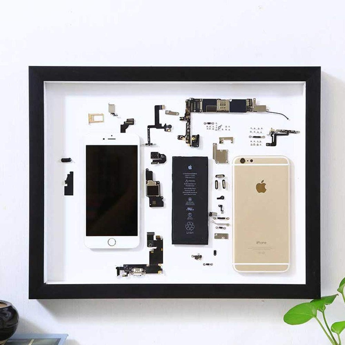 this-company-frames-disassembled-phones-for-home-decor